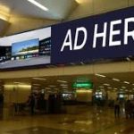 Chicago O’Hare International Airport advertising showcasing digital billboards, wall wraps, and passenger engagement zones for premium brand visibility
