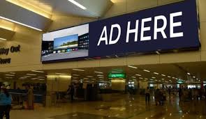Chicago O’Hare International Airport advertising showcasing digital billboards, wall wraps, and passenger engagement zones for premium brand visibility