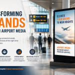 Modern digital airport advertising display showcasing premium brand promotion inside a busy airport terminal with travelers and large illuminated digital screens.