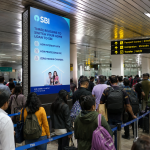 The Queue Advantage: Why Airport Advertising Wins in Places Where Consumers Cannot Scroll Away